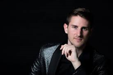 Gregor Ravnik, operni pevec (tenor) in pop pevec.